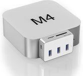 Top view of the redesigned compact Mac Mini M4 in silver aluminum finish, isolated on a white background.