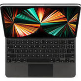 Black laptop with colorful display on a black background